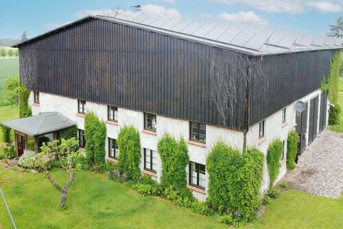 Außenansicht - Ostseenahe Investitionschance: Erfolgreiches Ferienwohnungsensemble in historischer Gutsscheune