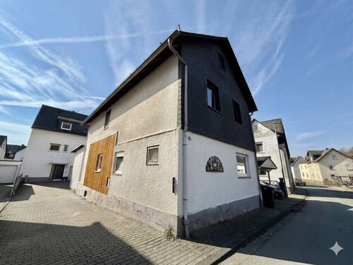 Ansicht seitlich - Einfamilienhaus mit 123,00 m&sup2; in Braunfels / Tiefenbach zum Kaufen