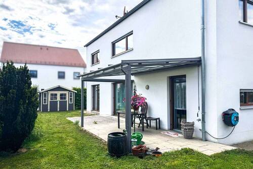 Garten - Modernes Einfamilienhaus mit Garten und Garage in familienfreundlicher Lage