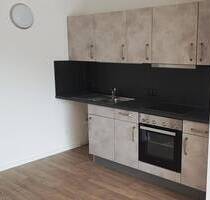 Zentrale 1-Raumwohnung mit Balkon & Einbauküche - ideal für Singles, Paare, Azubis & Homeoffice! - Aue