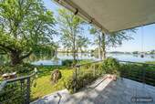 Terrasse im Erdgeschoss mit Gartenzugang - 