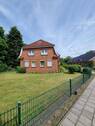 Hauptansicht vom Garten - Mehrfamilienhaus, Wohnhaus mit 350,00 m² in Weener zum Kaufen