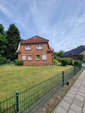 Hauptansicht vom Garten - Mehrfamilienhaus, Wohnhaus mit 350,00 m² in Weener zum Kaufen