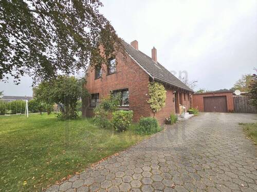 Ansicht Seite - 4 Zimmer Einfamilienhaus zum Kaufen in Weener
