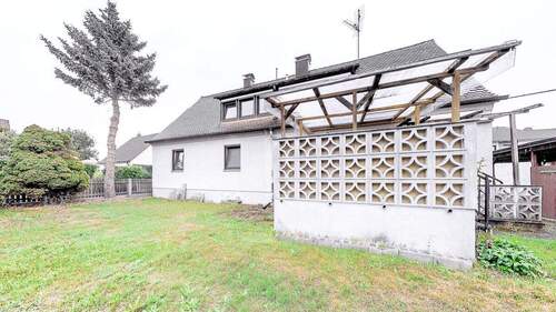 Bild 2 - 7 Zimmer Mehrfamilienhaus, Wohnhaus zum Kaufen in Erlangen / Frauenaurach