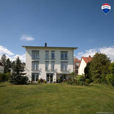 REMAX Immobilien DeLux Einfamilienhau Rückansicht Neunkirchen Mark Borowicz - 