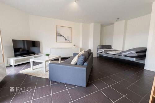 Wohnzimmer - (KI generiert) - 2 Zimmer Etagenwohnung zum Kaufen in Köln