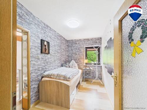 RE/MAX Immobilien DeLux Haus in Saarhölzbach zu verkaufen - Reihenmittelhaus mit 177,50 m&sup2; in Mettlach / Saarhölzbach zum Kaufen