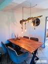 Offenes Esszimmer mit Anbindung zur Küche - 
