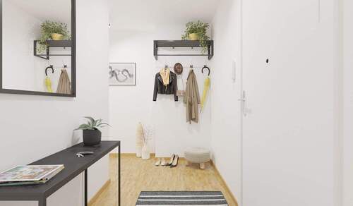 Der Eingangsbereich bietet Raum für Garderobe und Schuhe - 