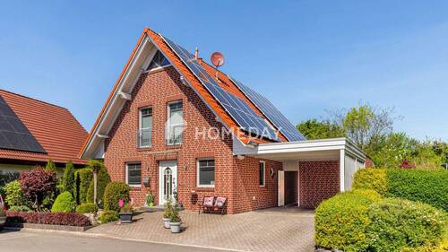 Außenansicht 2 - Charmantes Einfamilienhaus mit moderner Ausstattung und großzügigem Garten auf Erbpachtgrundstück