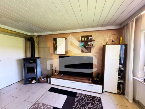 Wohnzimmer Teilansicht.png - Einfamilienhaus mit 140,00 m² in Trier zum Kaufen