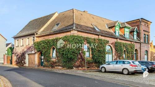 Außenansicht 4 - 1 Zimmer Mehrfamilienhaus, Wohnhaus zum Kaufen in Delitzsch