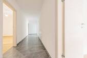 Flur - Etagenwohnung mit 114,60 m² in Büchlberg / Saderreut zum Kaufen