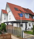 Außenansicht vorne - Modernisierte DHH-Hälfte in Bubenreuth