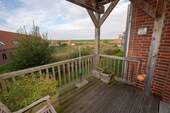 Balkon - Ferienwohnung mit Sauna in Wremen: Investition und Auszeit vereint