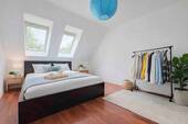 Schlafzimmer I OG (digital gestaged) - 