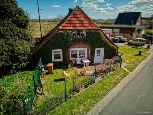 Strasse - 8 Zimmer Einfamilienhaus zum Kaufen in Bockhorn
