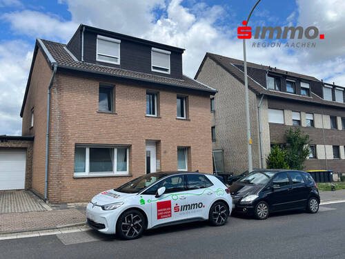 Titelbild mit Logo - Modernisiertes 3- Familienhaus mit Garage am Fuße des Broichbachtals