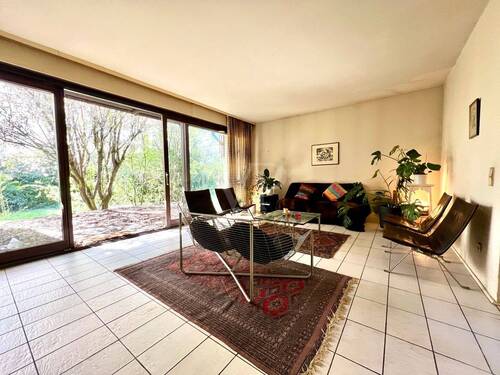 Wohn- und Essbereich mit 70's Charme - 6 Zimmer Einfamilienhaus zum Kaufen in Kelkheim (Taunus)