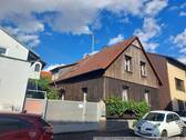 Ansicht - Gemütliches Einfamilienhaus mit Schopf, Garage und Büroraum über der Garage!