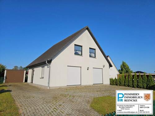 Haus und Garage.jpg - Einfamilienhaus als Niedrigenergiehaus für Sie gebaut!
