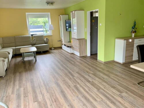 Wohnzimmer EG - 1 Zimmer Mehrfamilienhaus, Wohnhaus zum Kaufen in Norden