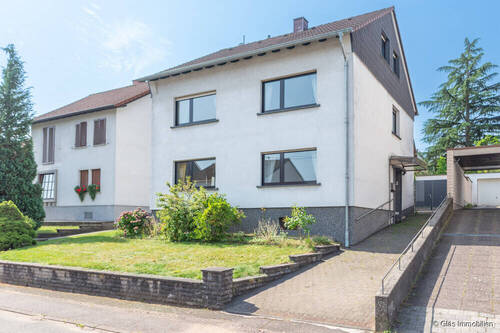 Zwei- bis Dreifamilienhaus in bevorzugter Wohnlage - Glockenberg - Zwei- bis Dreifamilienhaus mit Garage und Pergola in bevorzugter Wohnlage
