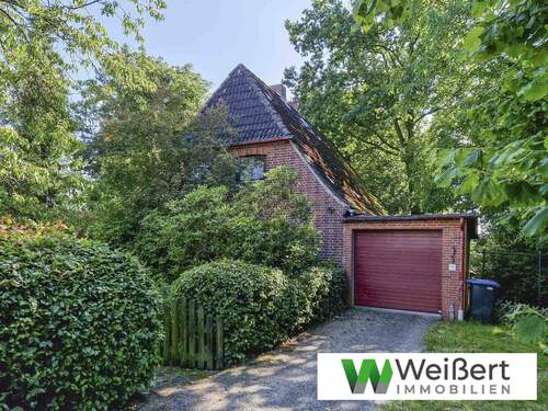 Nordwestansicht - Handwerker aufgepasst! Einfamilienhaus mit Potenzial und großzügigem 1.285 m² Grundstück