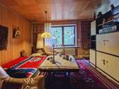 Wohnzimmer im EG - 4 Zimmer Einfamilienhaus in Schlotfeld