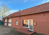 Ansicht Gewerbe v Westen - Mehrfamilienhaus, Wohnhaus in Uchte zum Kaufen