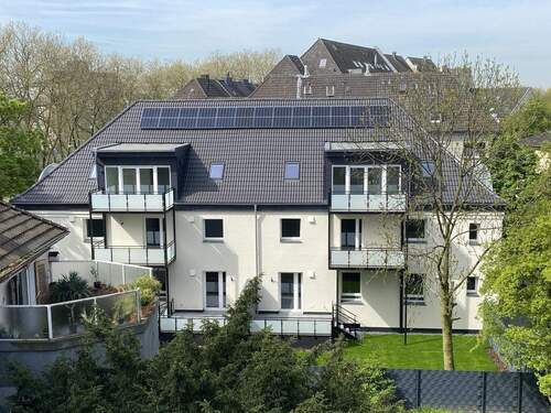 Rückansicht - !!! Die letzte Wohnung im Objekt !!! Energetisch sanierte ETW im 1. OG mit eigenem Stellplatz und Balkon