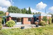 Ein Ort zum Wohlfühlen. - Charmanter Bungalow auf über 430 m² sonnenverwöhntem Süd-Grundstück in Lohbrügge
