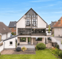Architektonisch einzigartiges Zweifamilienhaus mit Loft-Charakter und großem Südgarten in Erftstadt