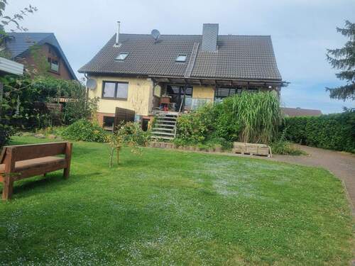 Rückansicht gilt.jpg - 5 Zimmer Mehrfamilienhaus, Wohnhaus in Wittendörp