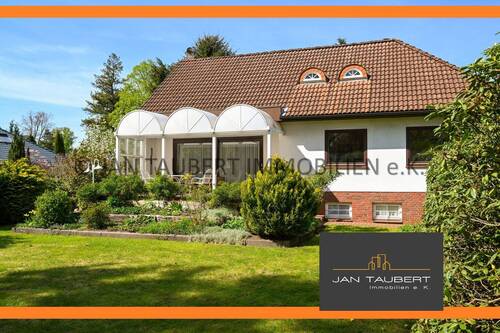 Hausansicht Südseite - *EINFAMILIENHAUSHAUS MIT POTENTIAL* - ehemaliger Bungalow mit wohnlich genutzter Doppelgarage