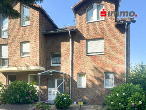 Front - Gepflegte, helle ETW über 2 Etagen mit Süd-West-Garten und Garage