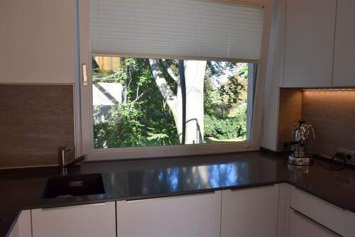 EBK mit Blick in den Garten - Etagenwohnung mit 52,00 m&sup2; in Hamburg zur Miete