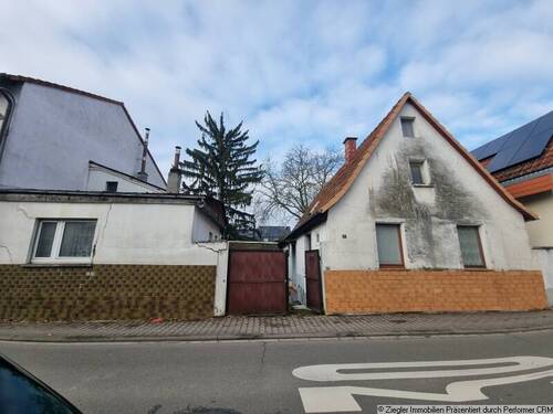 1 Straßenansicht - Sonniges Abrissgrundstück mit viel Potential in ruhiger Lage von Brühl - 00004049