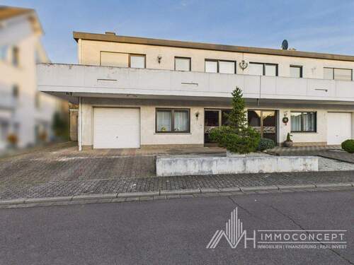 Vorderansicht - Solide Doppelhaushälfte mit Potenzial in ruhiger Wohnlage von Saarlouis-Fraulautern