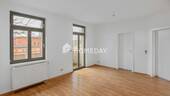Wohnzimmer 1 - Sofort bezugsfrei: Charmante Dachgeschosswohnung mit Balkon in beliebter Lage