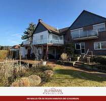 31515 Wunstorf - Großenheidorn - Zweifamilienhaus mit Teich und Garagen