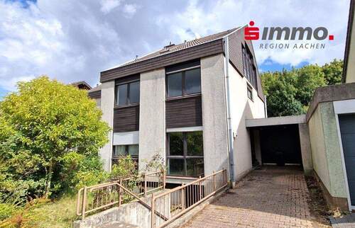 Titelbild - Großes, modernisierungsbedürftiges Einfamilienhaus mit 5 Schlafzimmern und drei Bädern in Richterich