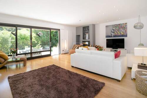 Wohnzimmer mit Terrassenzugang - Bungalow mit 233,00 m² in Rüsselsheim / Haßloch zum Kaufen