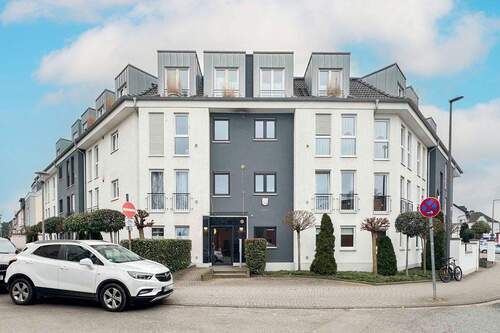 Frontansicht - Moderne 3-Zimmer-Wohnung mit Terrasse, Tiefgaragenstellplatz und barrierearmer Ausstattung