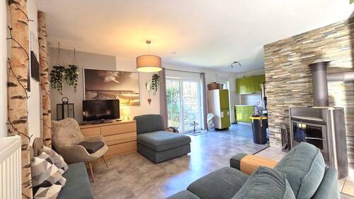 Wohnbereich Blick in die Küche - Einfamilienhaus mit 82,60 m&sup2; in Pronstorf zum Kaufen