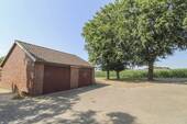 Garage - Einfamilienhaus mit 238,30 m&sup2; in Scholen zum Kaufen