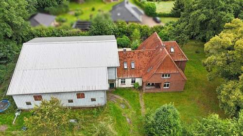 Titelbild - 6 Zimmer Mehrfamilienhaus, Wohnhaus zum Kaufen in Weddingstedt