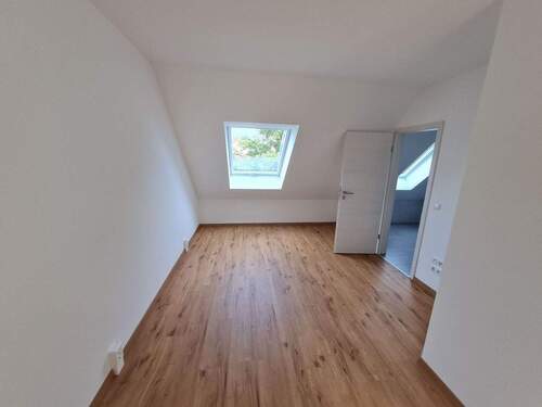 Zimmer im Dachgeschoss - 