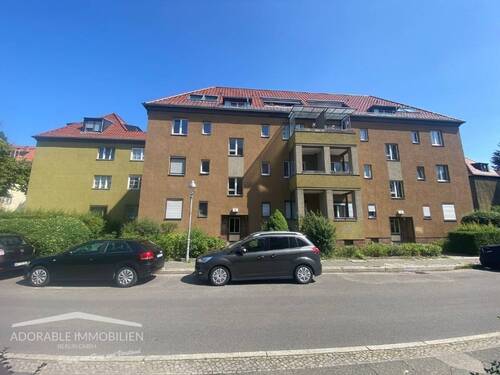 Hausansicht - Sorglos-Investment in Berlin-Spandau: Langfristig vermietete DG-Wohnung mit Süd-Balkon